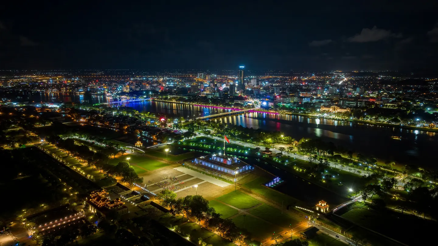 Huế glowing beside the river at night